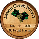 Lemon Creek Winery logo. A brown wood barrel top features a bunch of grapes. Writing on the barrel says Lemon Creek Winery & Fruit Farm, Est. 1855 in a black serif font.